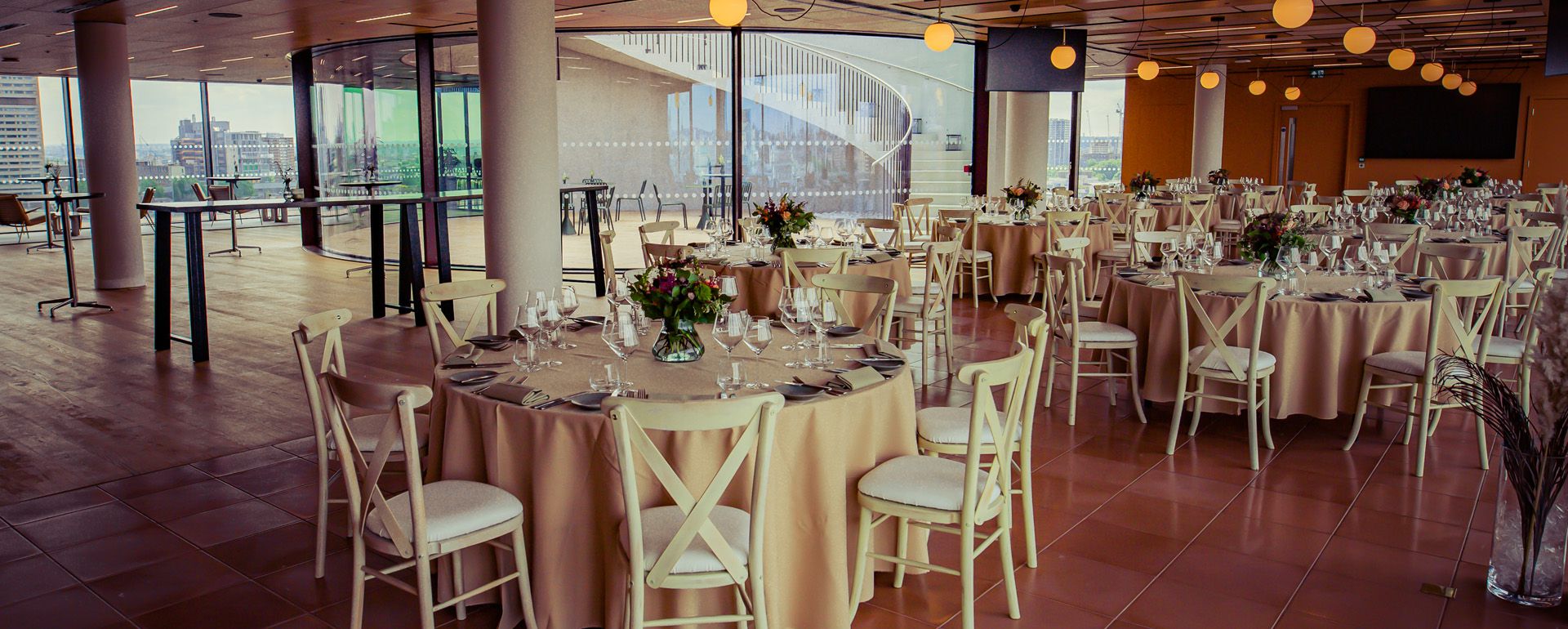 Wedding venue space with dressed tables